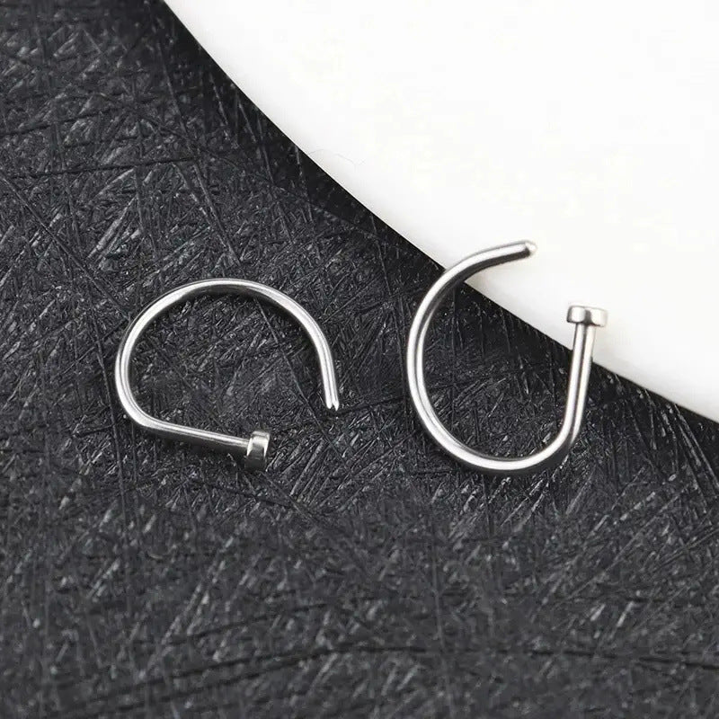 Mariam's Collection MAC167 D-Type Nose Ring — Mariam's Collection branding close-up
