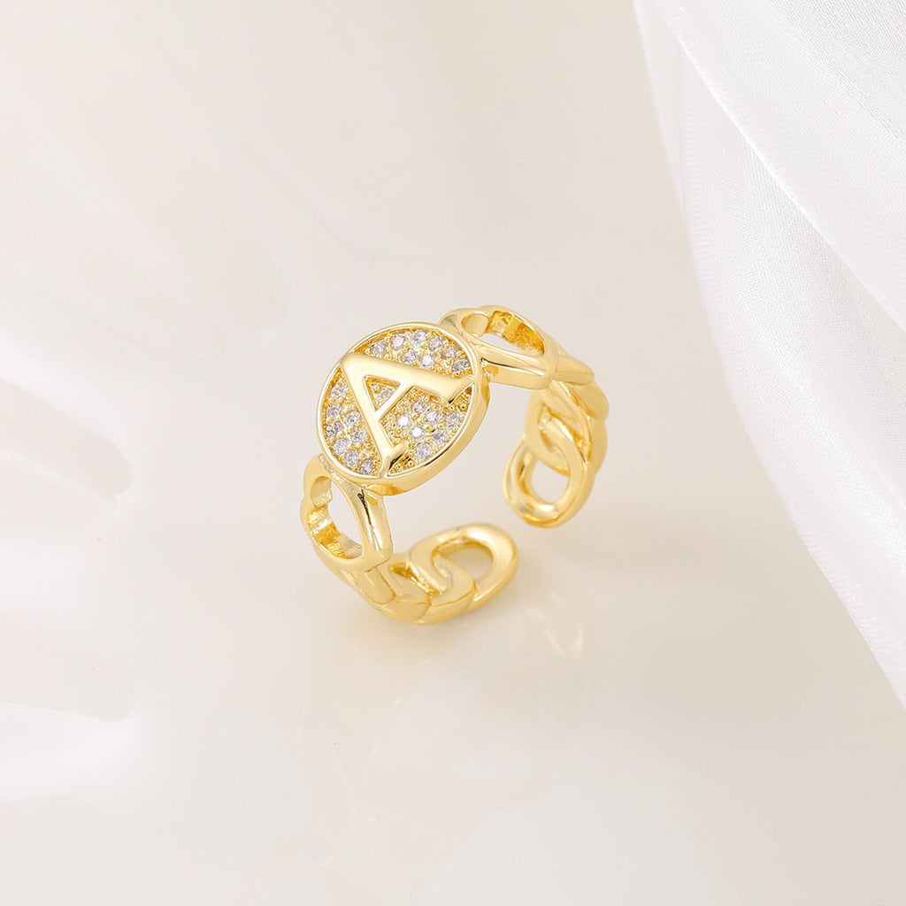 Mariam's Collection MAC186 Copper Set With Zircon 18K Real Gold Love Glossy Letter Ring — Mariam's Collection branding close-up