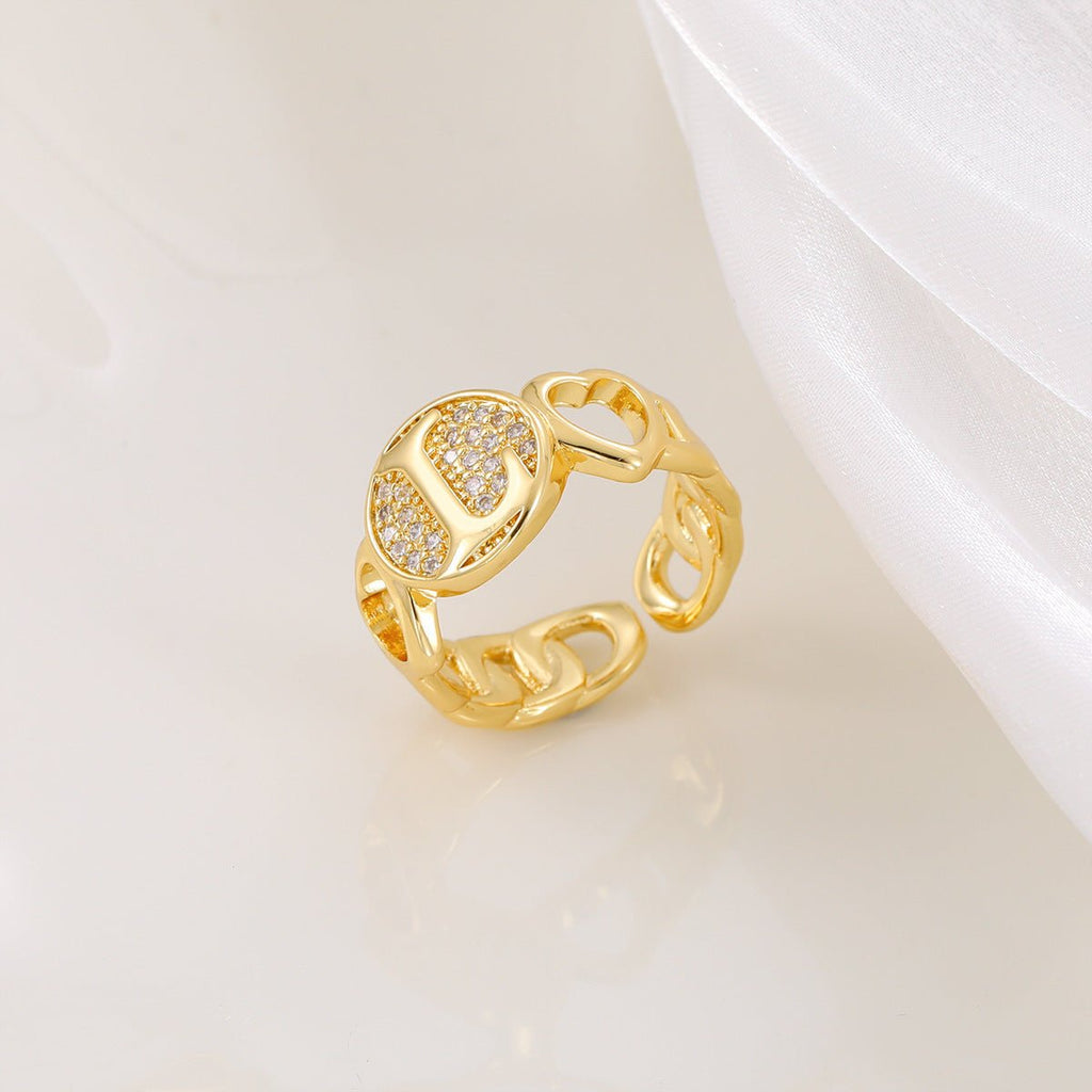 Mariam's Collection MAC186 Copper Set With Zircon 18K Real Gold Love Glossy Letter Ring — flat-lay composition