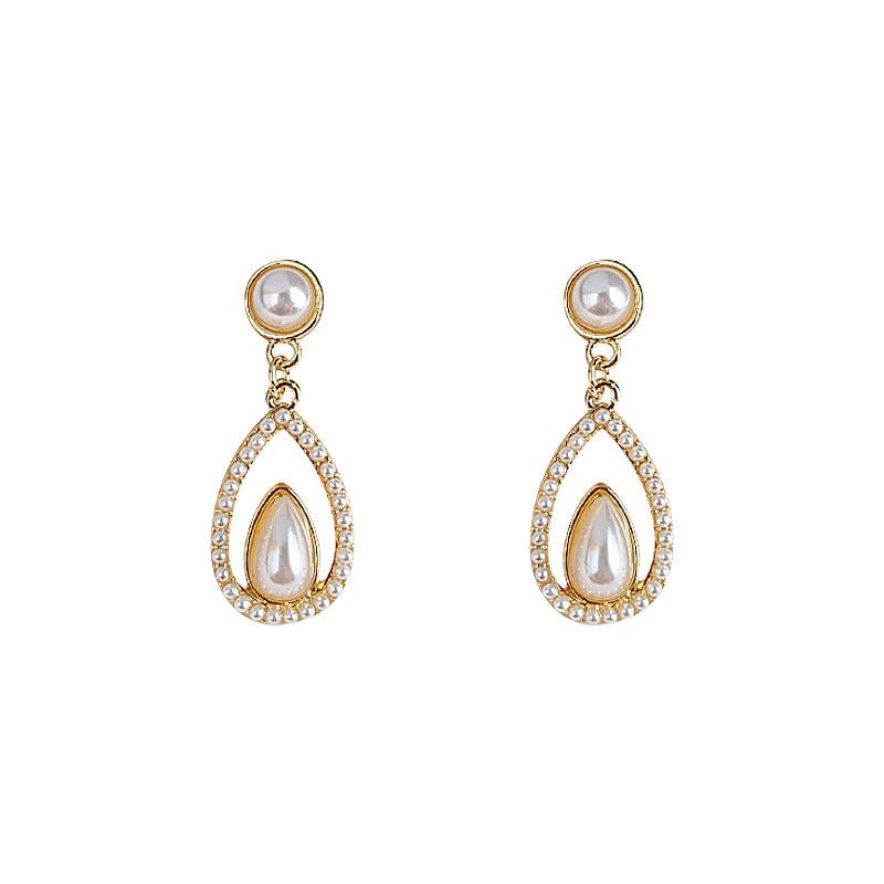 Mariam's Collection Palace style drop-shaped pearl earrings(MAC200) — Mariam's Collection branding close-up