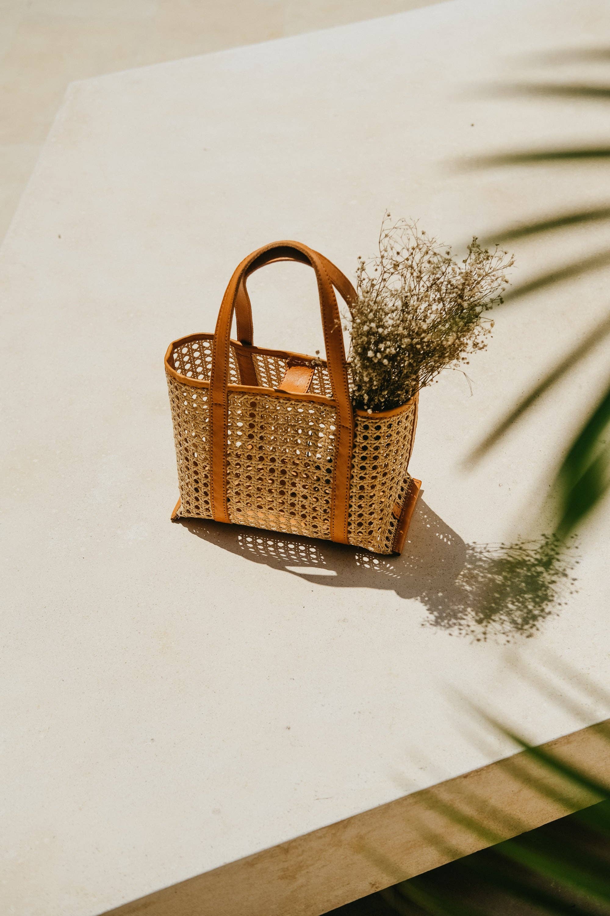 WONENA Pink Haley Magnolia Handmade Cane Woven and Leather Tote — artisan woven totes category context