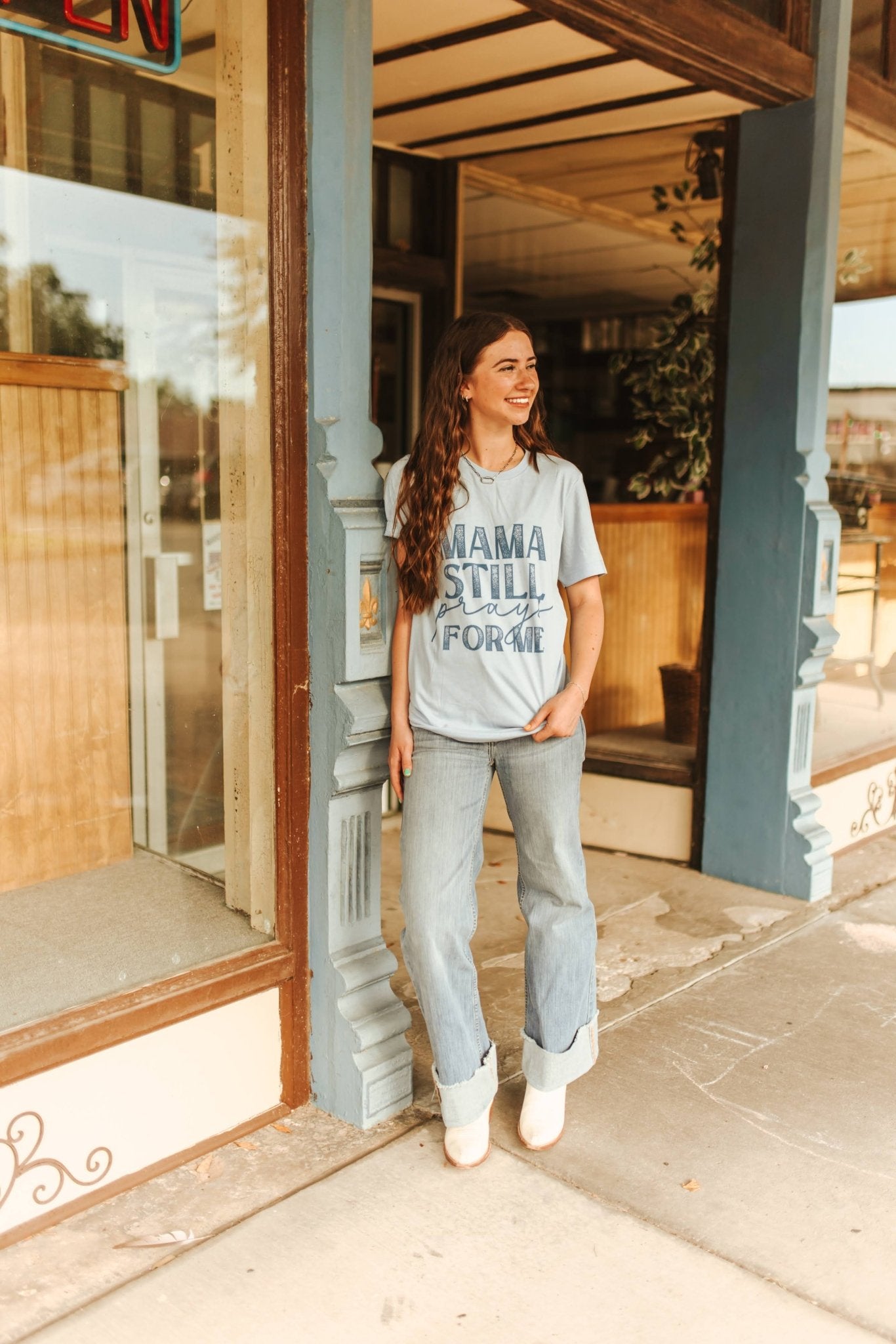 Wild Junkie Mama Still Prays For Me Graphic Tee — Wild Junkie branding close-up