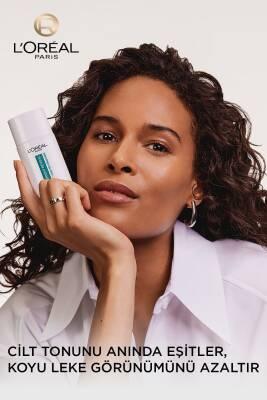 L'Oreal Paris Bright Reveal Tinted Sunscreen Fluid SPF 50 - Dark Spot Corrector, Evens Skin Tone, Medium Tint, Daily Sun Protection