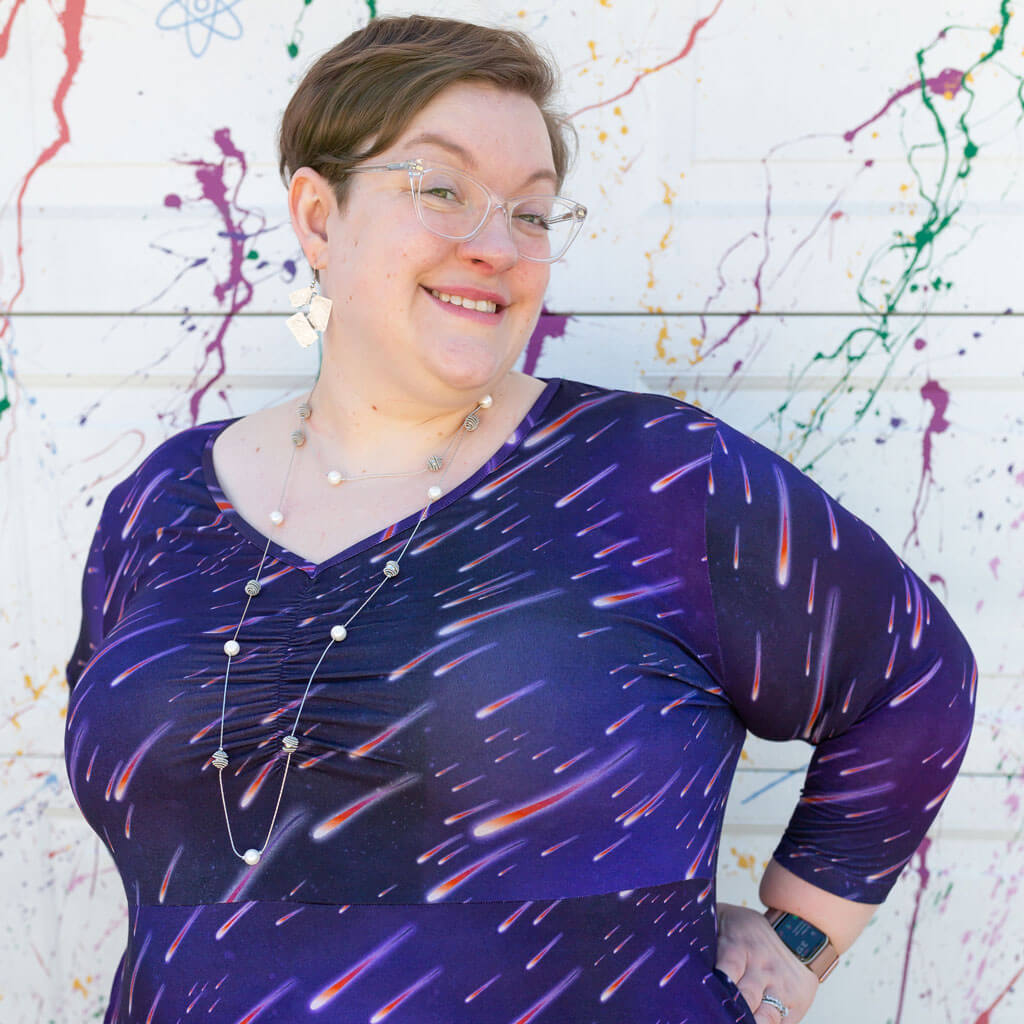 Princess Awesome & Boy Wonder Adult "Party Crashers" Meteor Shower V-Neck A-Line Dress with Sleeves and Pockets — lifestyle worn / used context