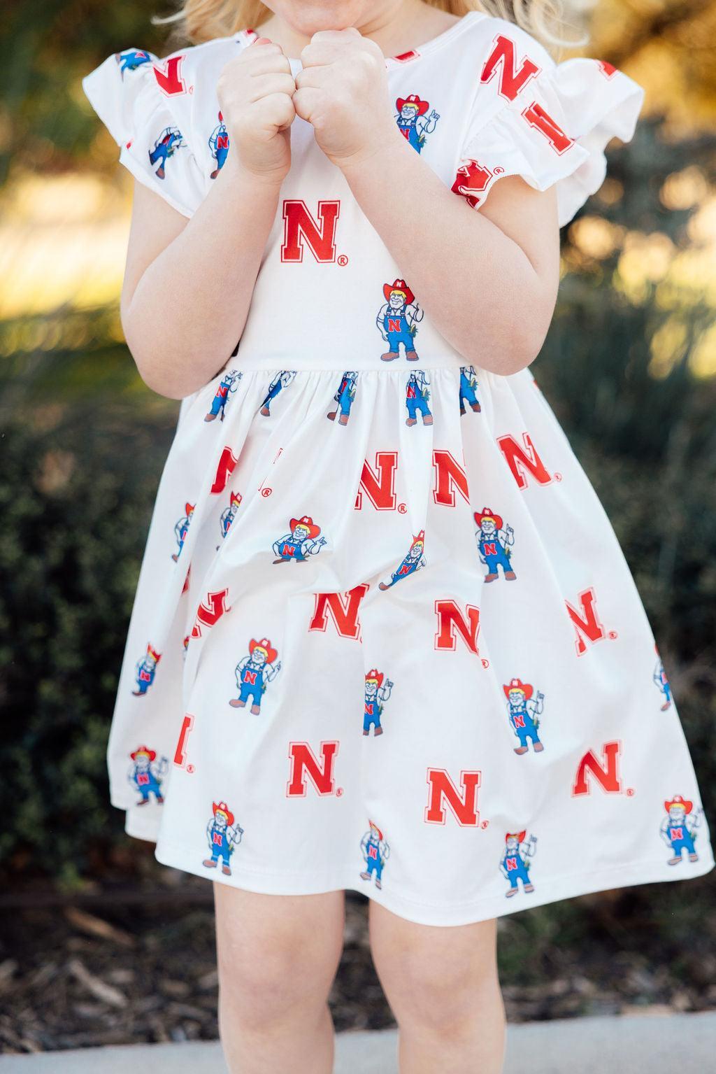Mila & Rose ® Nebraska White Herbie Husker Flutter Twirl Dress — back view
