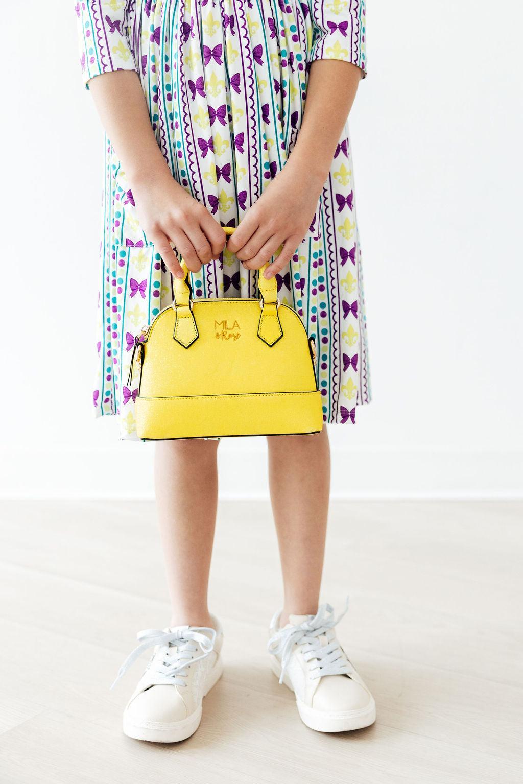 Mila & Rose ® Neon Yellow Glitter Girl's Crossbody Purse — lifestyle context