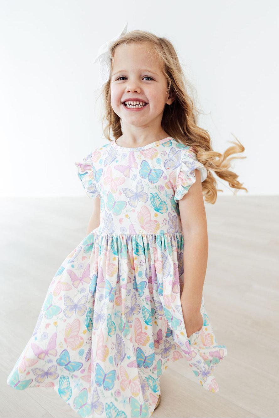 Mila & Rose ® Fluttering Butterflies Flutter Sleeve Twirl Dress — back view