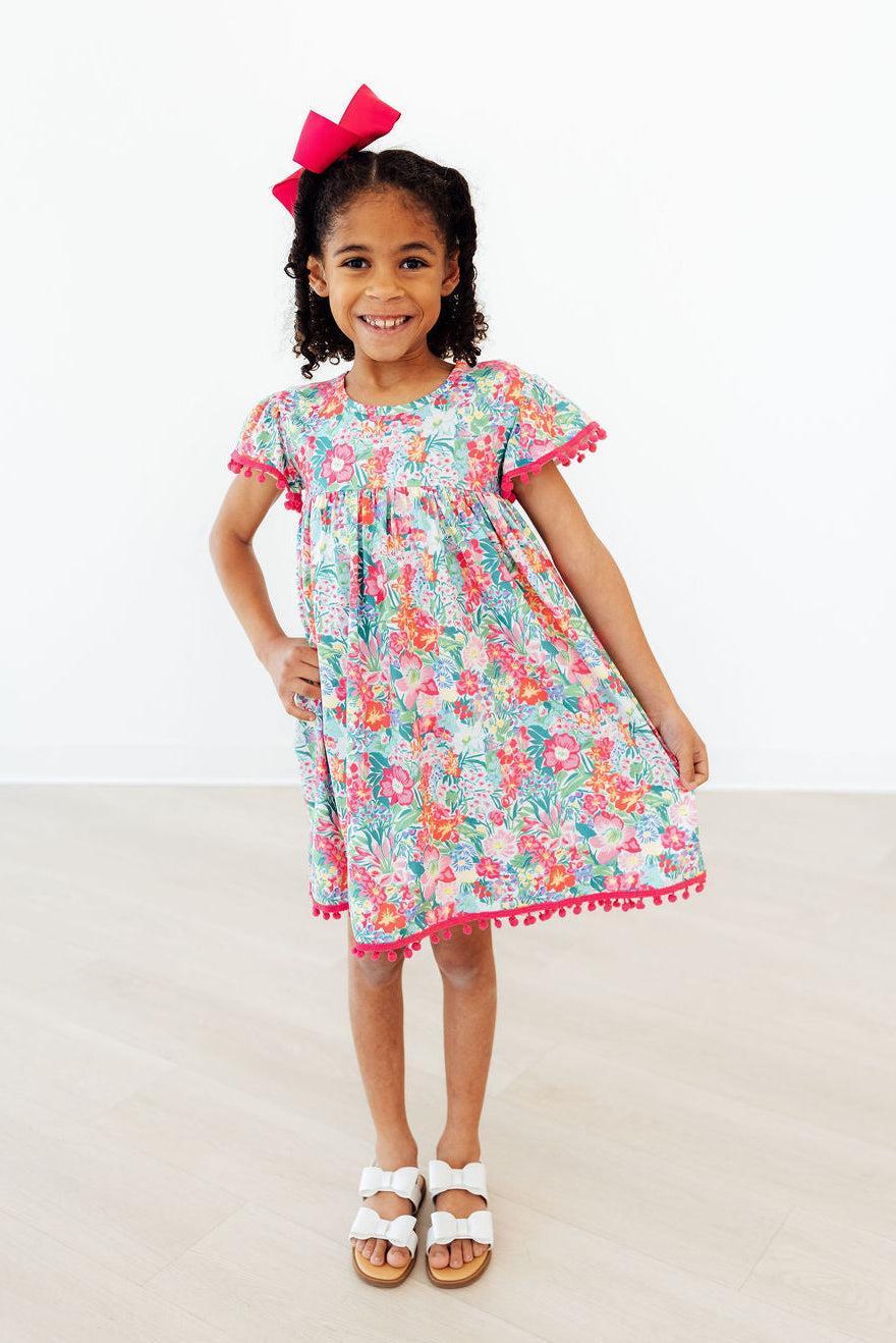 Mila & Rose ® Preppy Petals Pom Pom Dress — lifestyle context