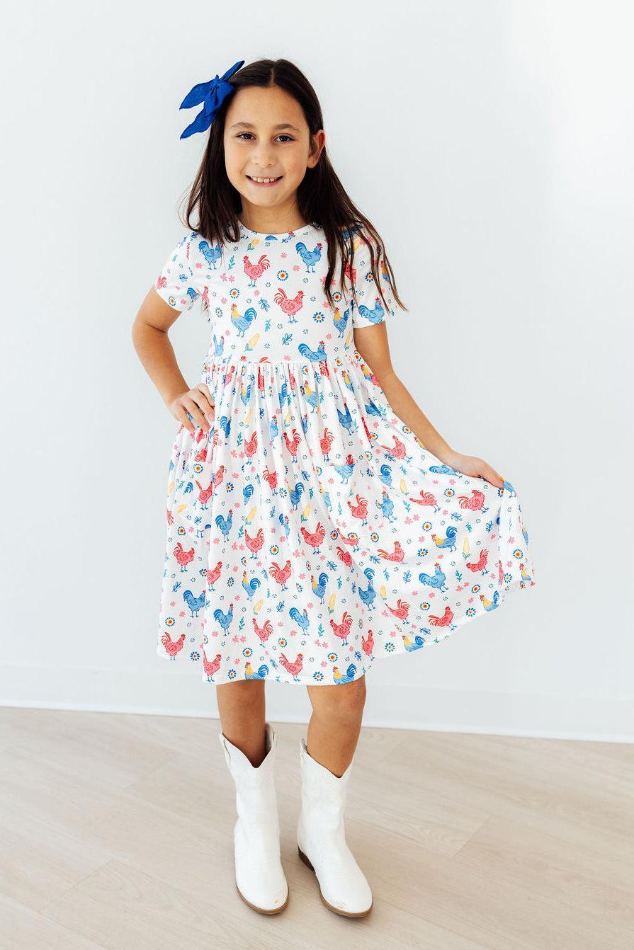 Mila & Rose ® Rainbow Roosters S/S Pocket Twirl Dress — detail close-up