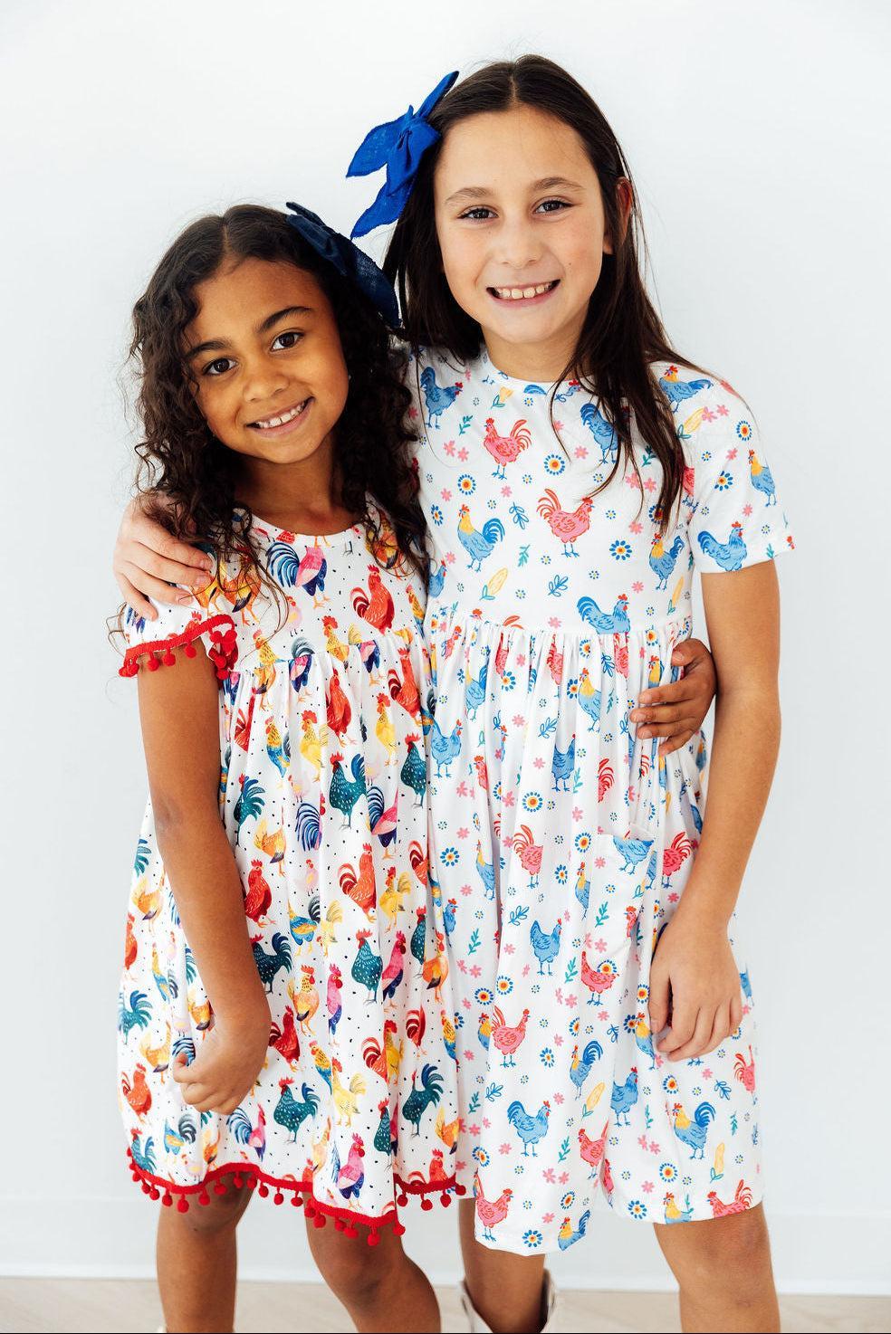 Mila & Rose ® Rooster Pom Pom Dress — lifestyle context