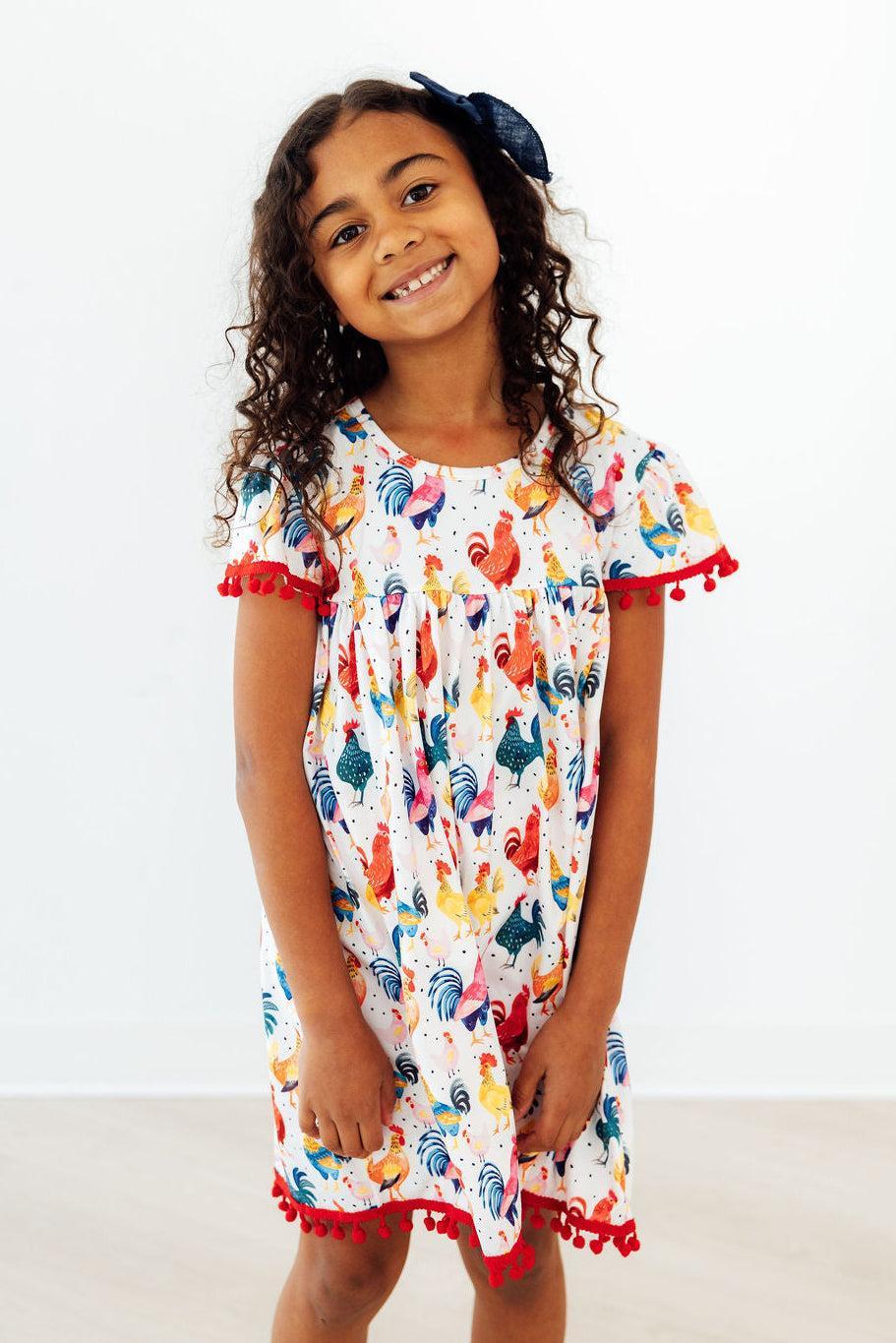 Mila & Rose ® Rooster Pom Pom Dress — side view