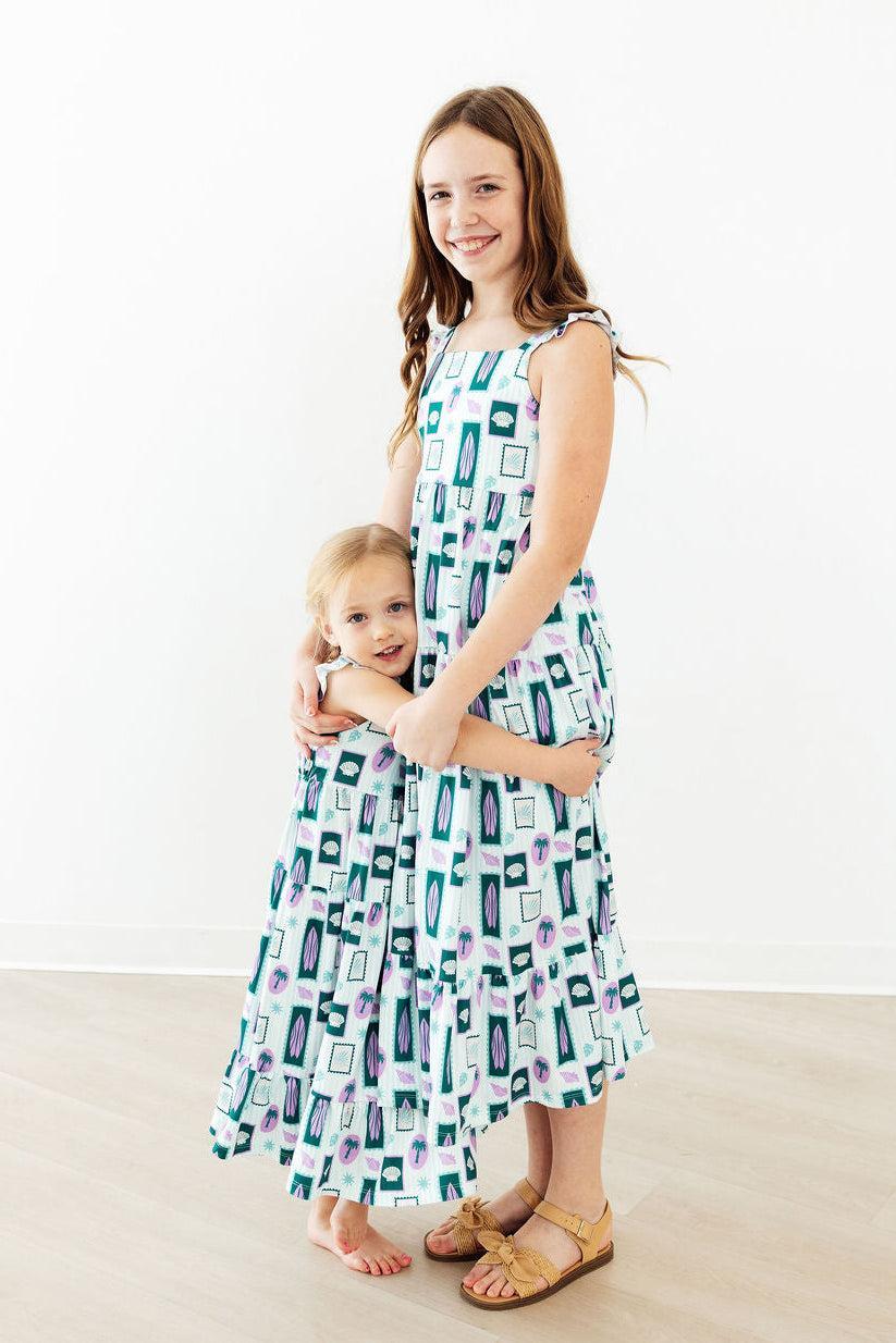Mila & Rose ® Surfer Girl Ruffle Maxi Dress — back view