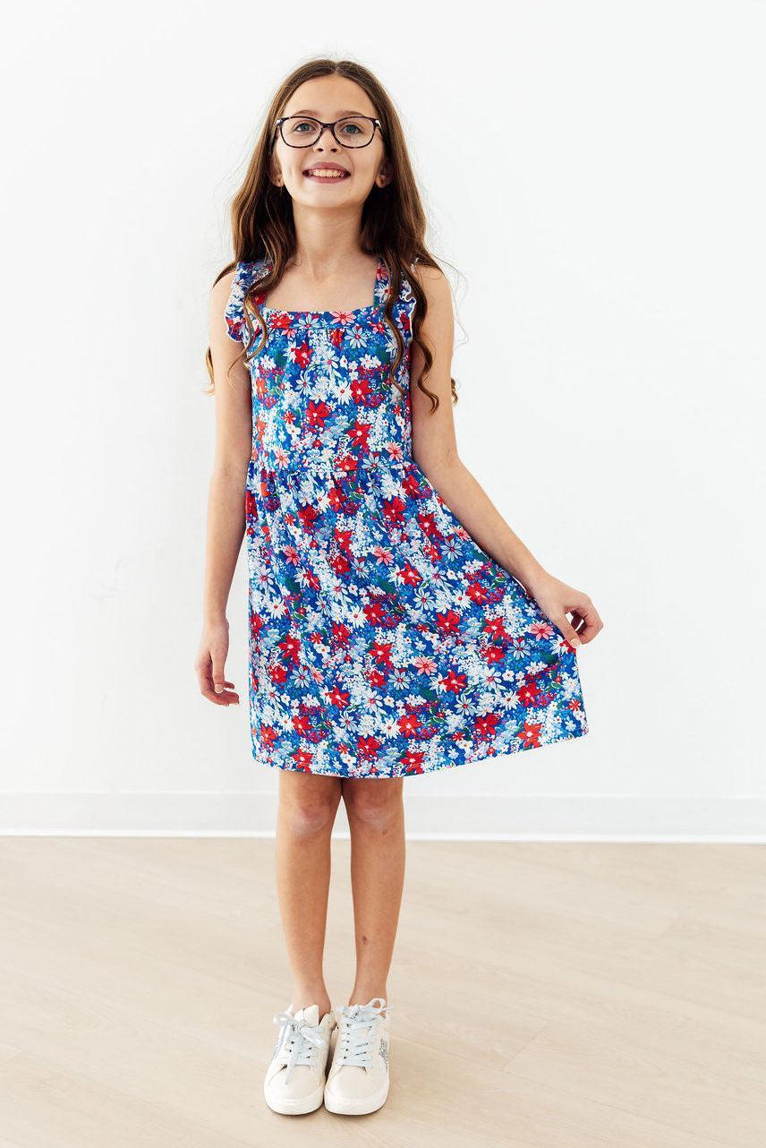 Mila & Rose ® Freedom Flowers Ruffle Cross Back Dress — detail close-up