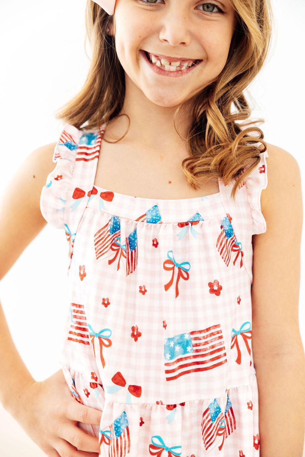 Mila & Rose ® Fancy Flags Ruffle Cross Back Dress — detail close-up