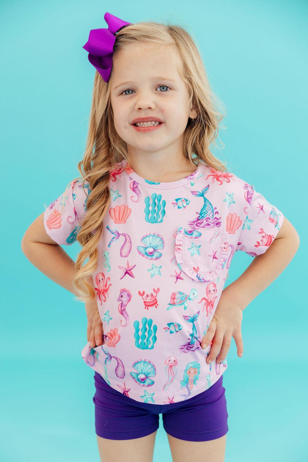 Mila & Rose ® Under the Sea Ruffle Pocket Tee — lifestyle context
