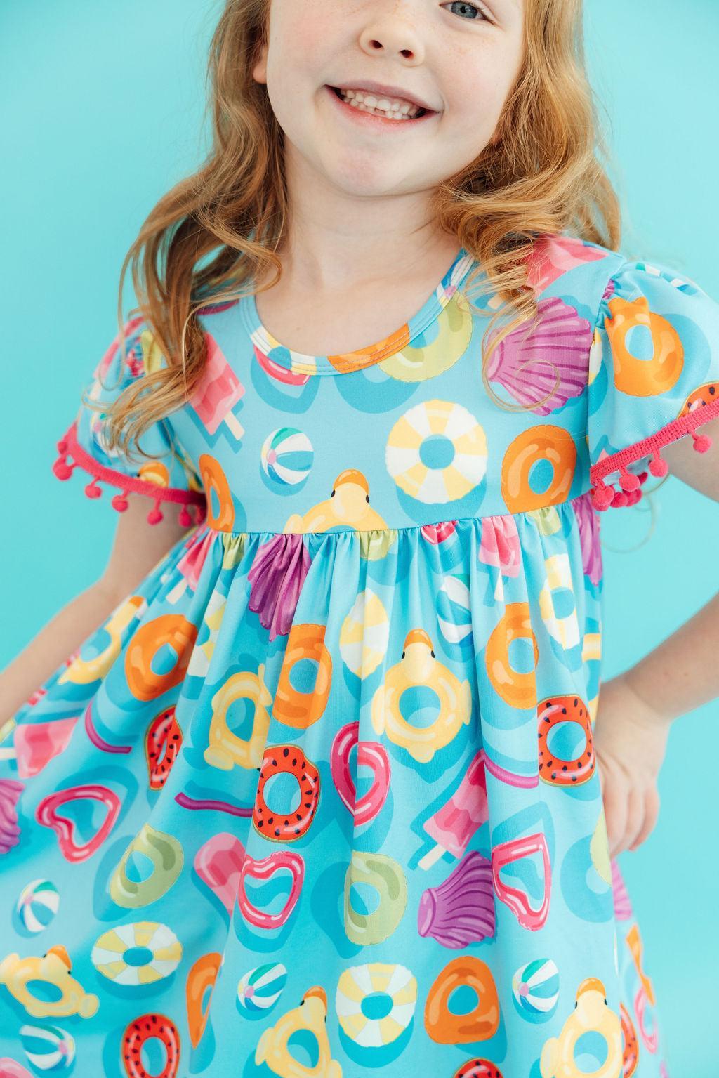 Mila & Rose ® Fun Floaties Pom Pom Dress — lifestyle context