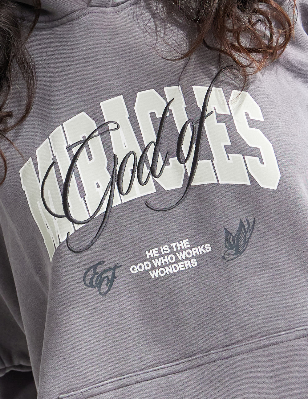 Elevated Faith God of Miracles Unisex Hoodie — construction detail