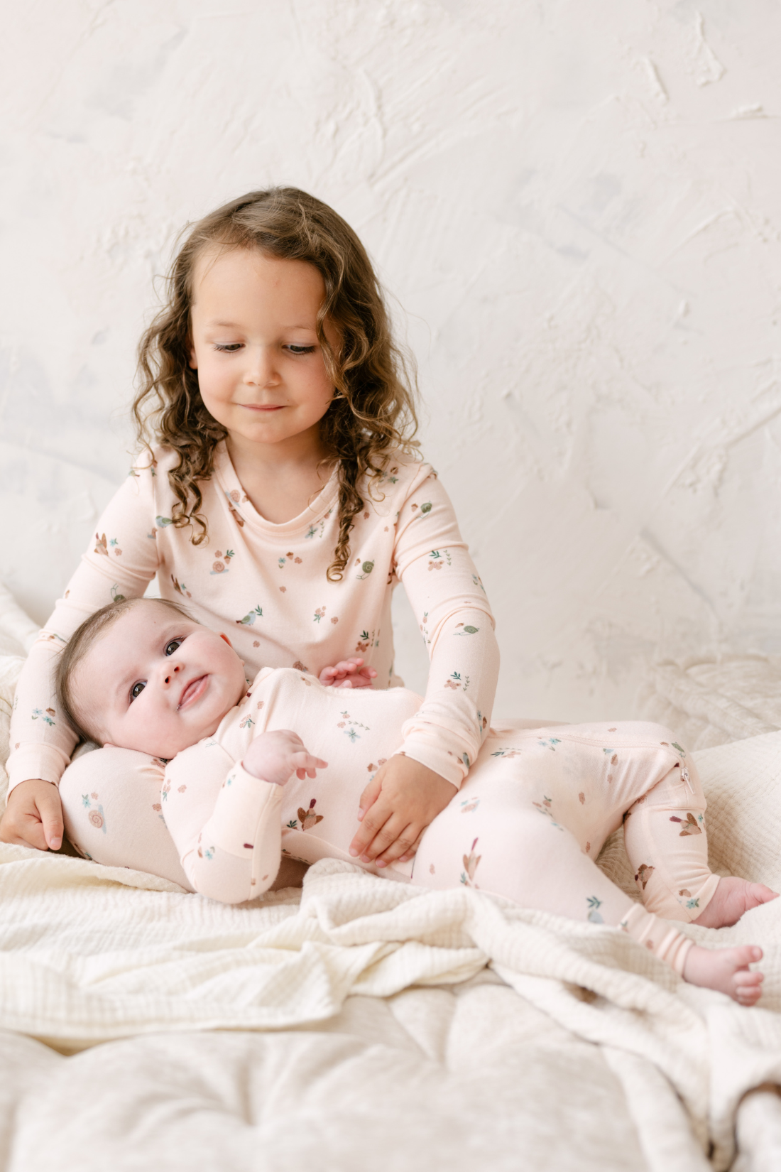 Dear Hayden Toddler Modal Pajama Set in Birds — Dear Hayden branding close-up