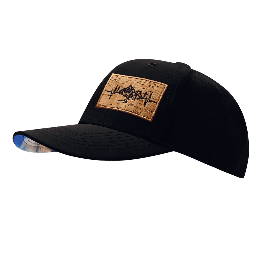 The Heartbeat Brand Mountains Hat - Baseball Hat Fit - Black - Laser Mesh — The Heartbeat Brand branding close-up