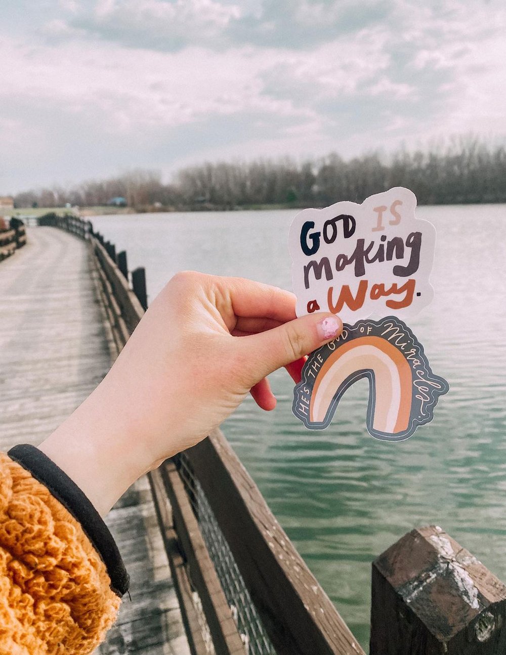 Elevated Faith Mystery Sticker — lifestyle context