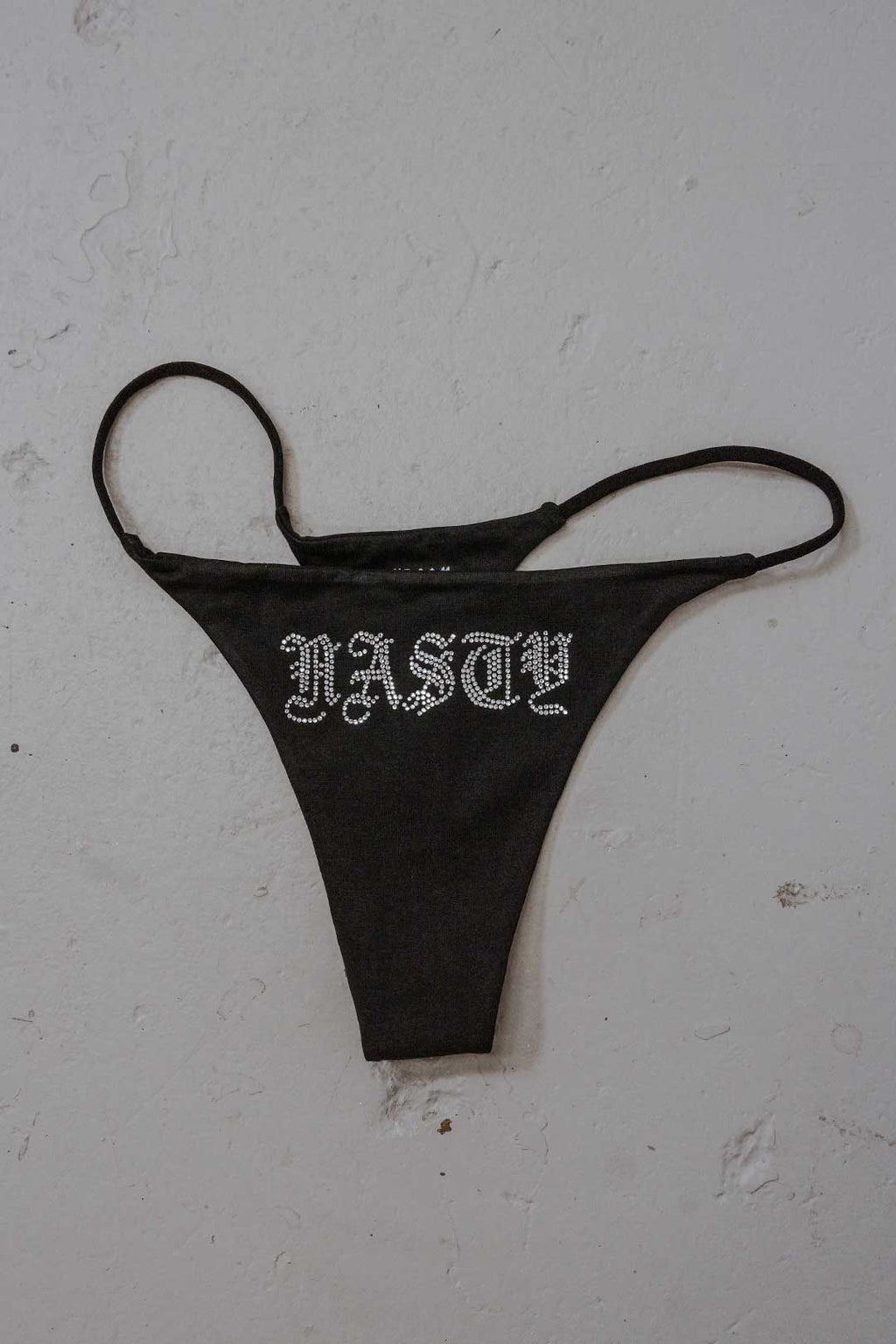 Thrash Happy Nasty Rhinestone Thong — detail close-up