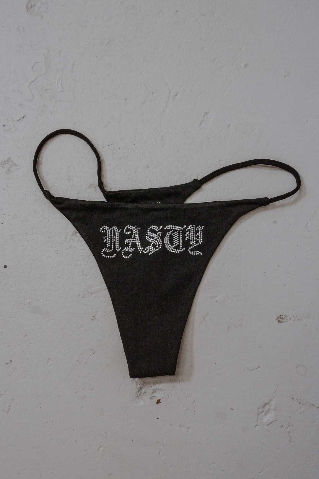 Thrash Happy Nasty Rhinestone Thong — detail close-up