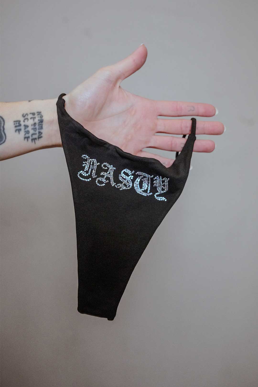 Thrash Happy Nasty Rhinestone Thong — main product shot