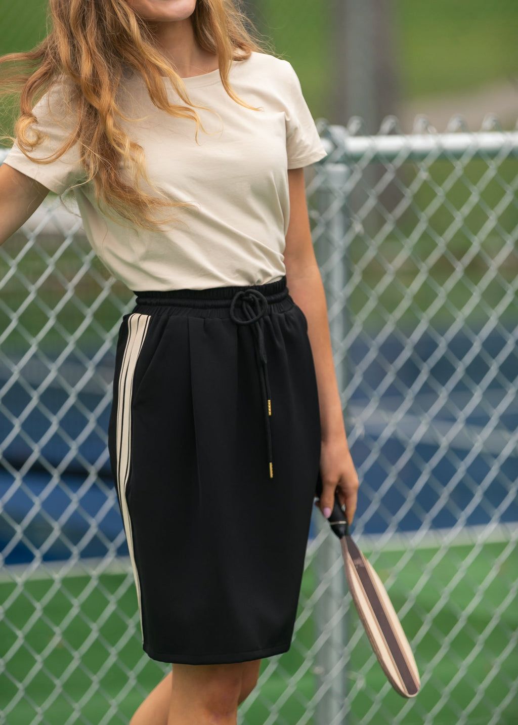 Inherit Co. Nina Mid-Rise Track Skirt — in-use photo