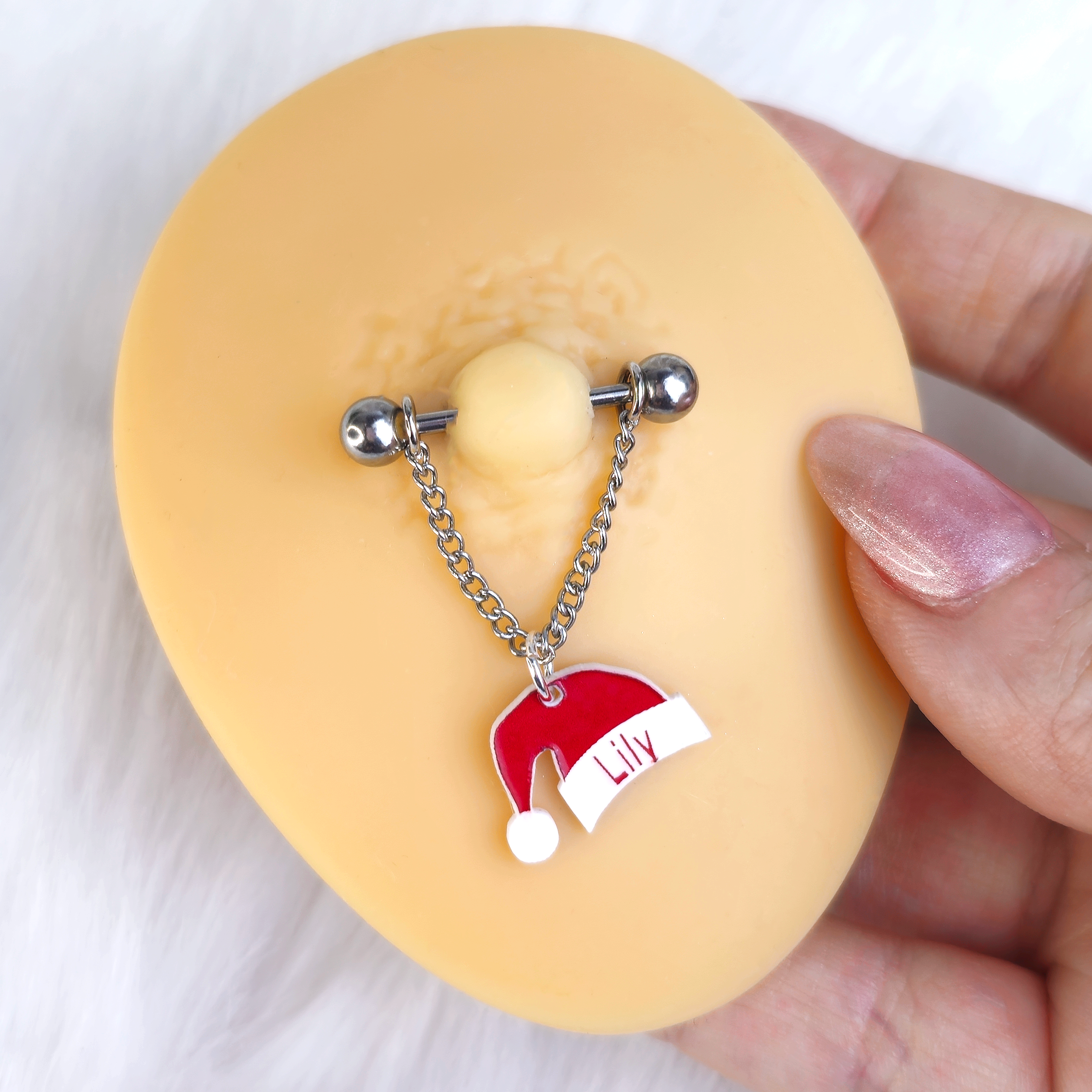 BodyCandy Custom Santa Hat Personalized Dangle Barbell Nipple Ring Set — side view