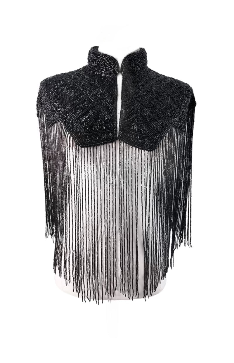 L'Jai Amor Noir Line Cape — lifestyle context