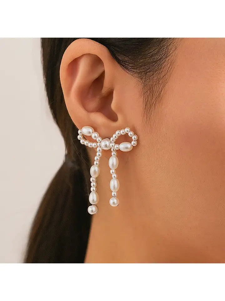 Pretty Little Patriot Pretty Little Patriot Bow earrings — Pretty Little Patriot branding close-up