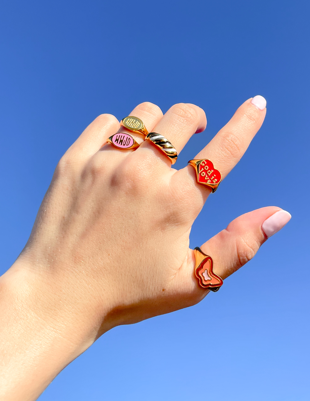 Elevated Faith Pink Enamel WWJD Ring — detail close-up