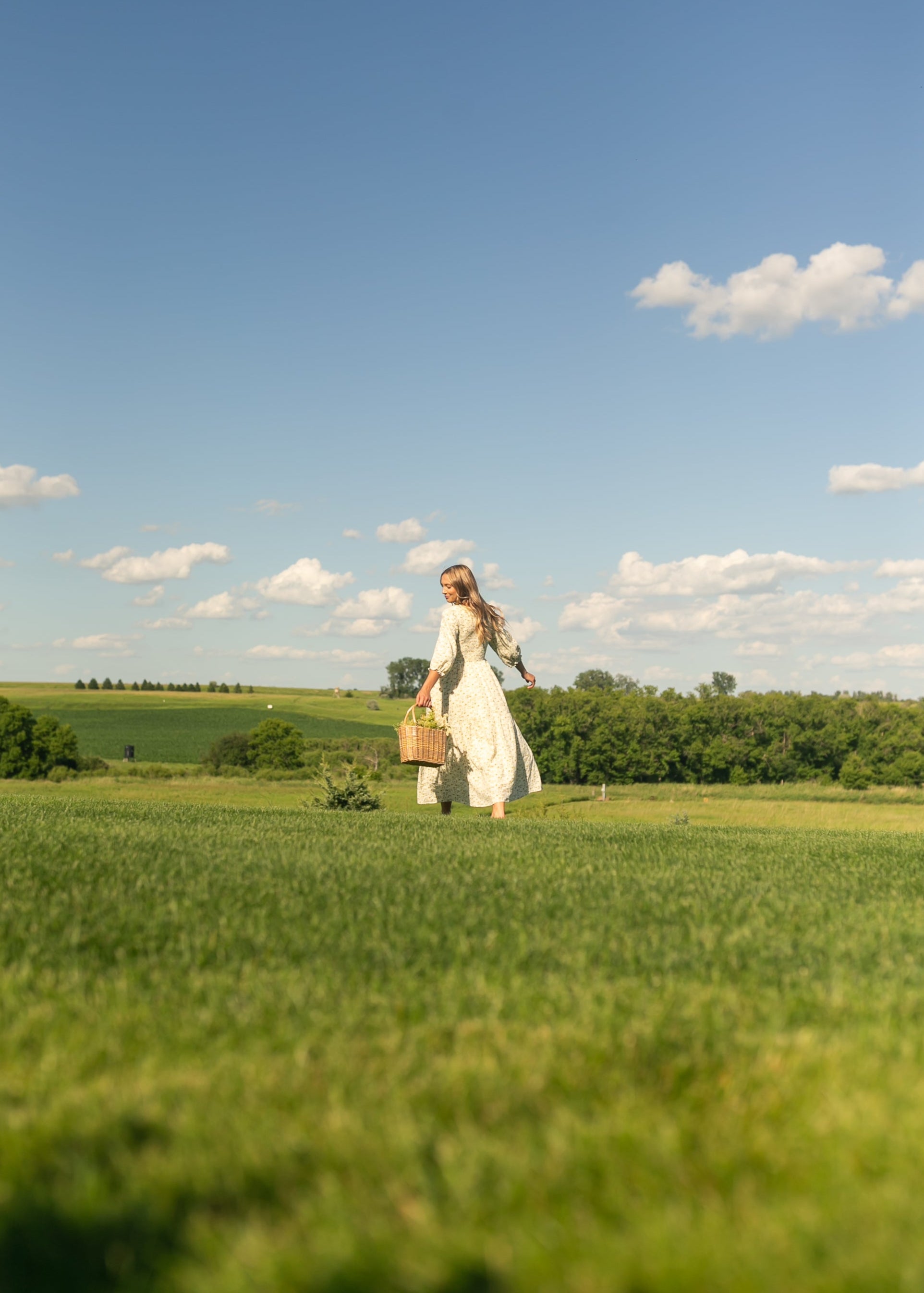 Inherit Co. Flora Smocked Midi Dress — lifestyle context