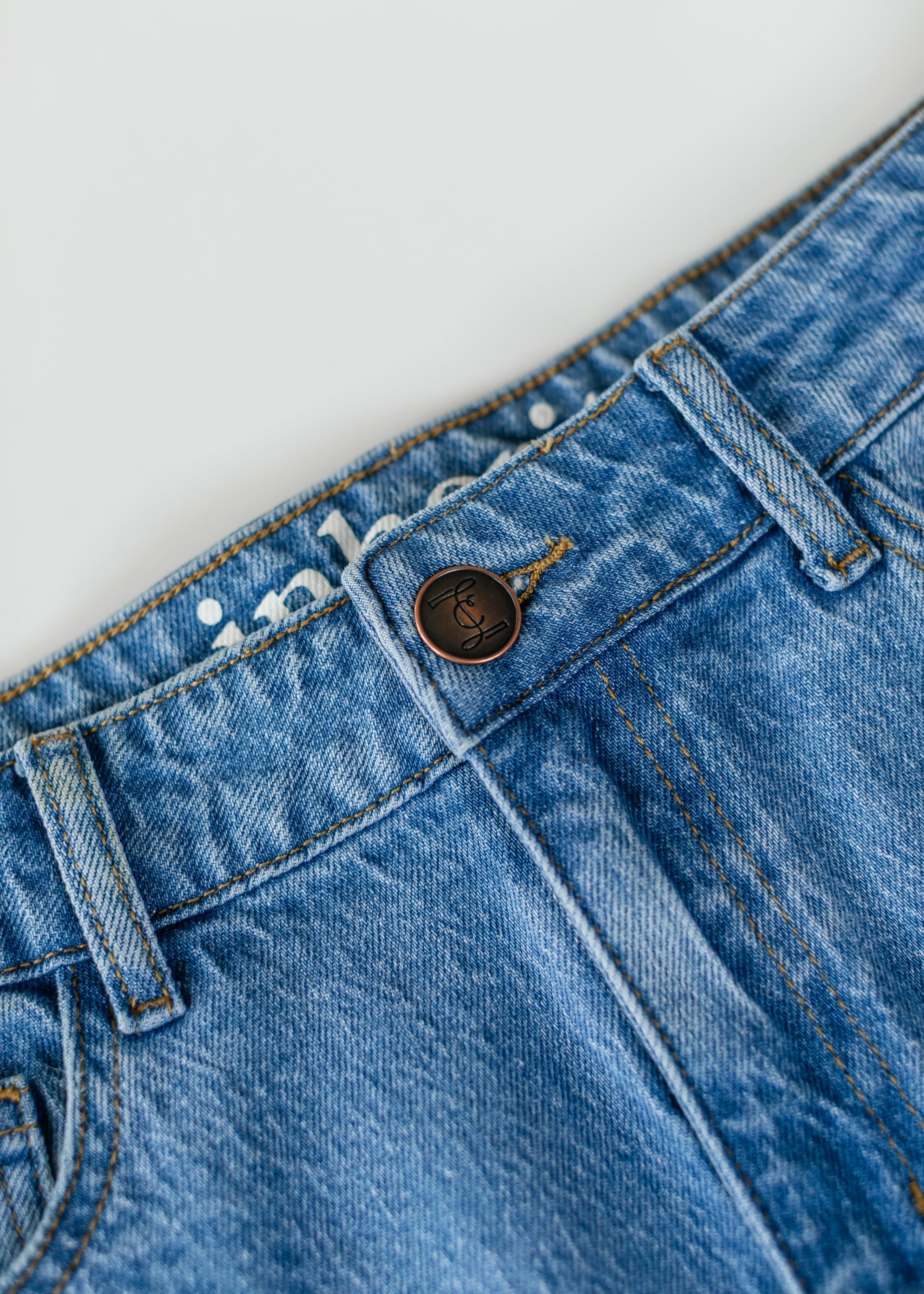 Inherit Co. Remi Denim Classic Wash Midi Skirt — product on model