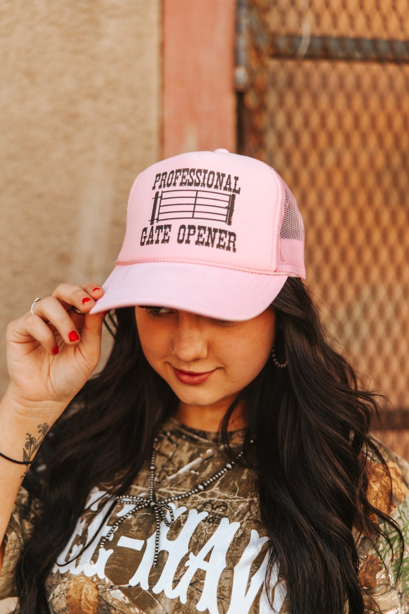 Wild Junkie Professional Gate Opener Trucker Hat — detail close-up