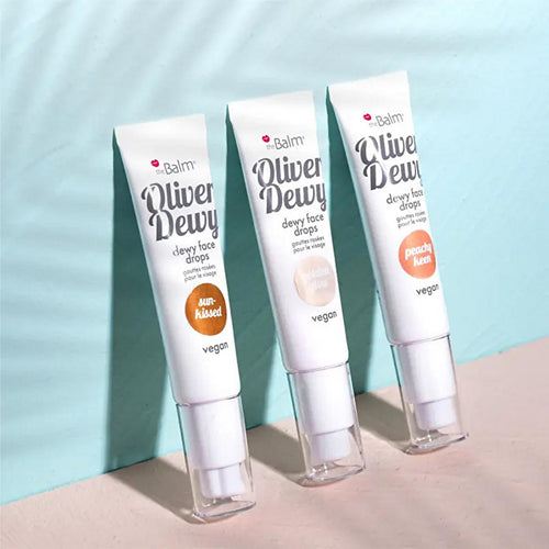 theBalm Oliver Dewy Face Drops Highlighter - Golden Glow: Achieve Radiant, Luminous Skin with this Illuminating Liquid Makeup