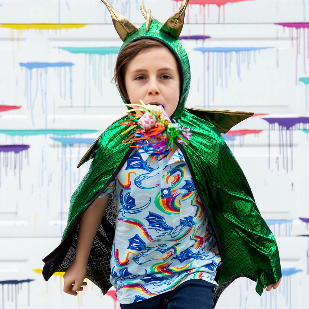 Princess Awesome & Boy Wonder Rainbow Breathing Dragons Short Sleeve Polo Shirt — Princess Awesome & Boy Wonder branding close-up