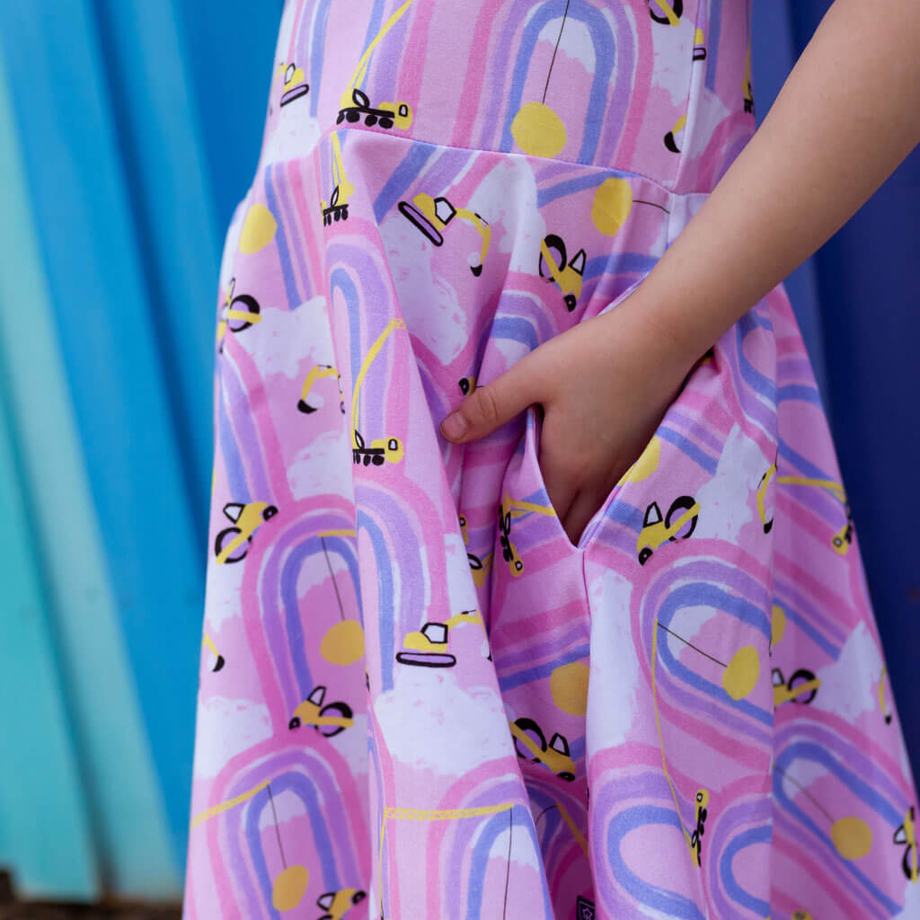 Princess Awesome & Boy Wonder "Rainbow Roadwork" Construction Trucks Super Twirler Dress with Pockets — lifestyle worn / used context