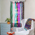 Darn Good Yarn Rainbow Oasis Drapes – Upcycled Boho Curtains — Darn Good Yarn branding close-up