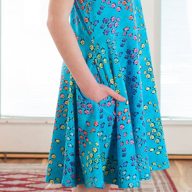 Princess Awesome & Boy Wonder "Summer School" Rainbows of Fish Sleeveless Play Dress with Pockets — lifestyle worn / used context