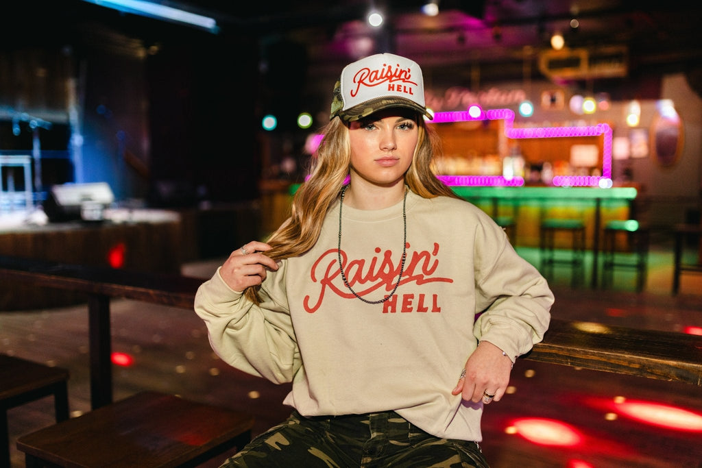 Wild Junkie Raisin' Hell Trucker Hat — main product shot