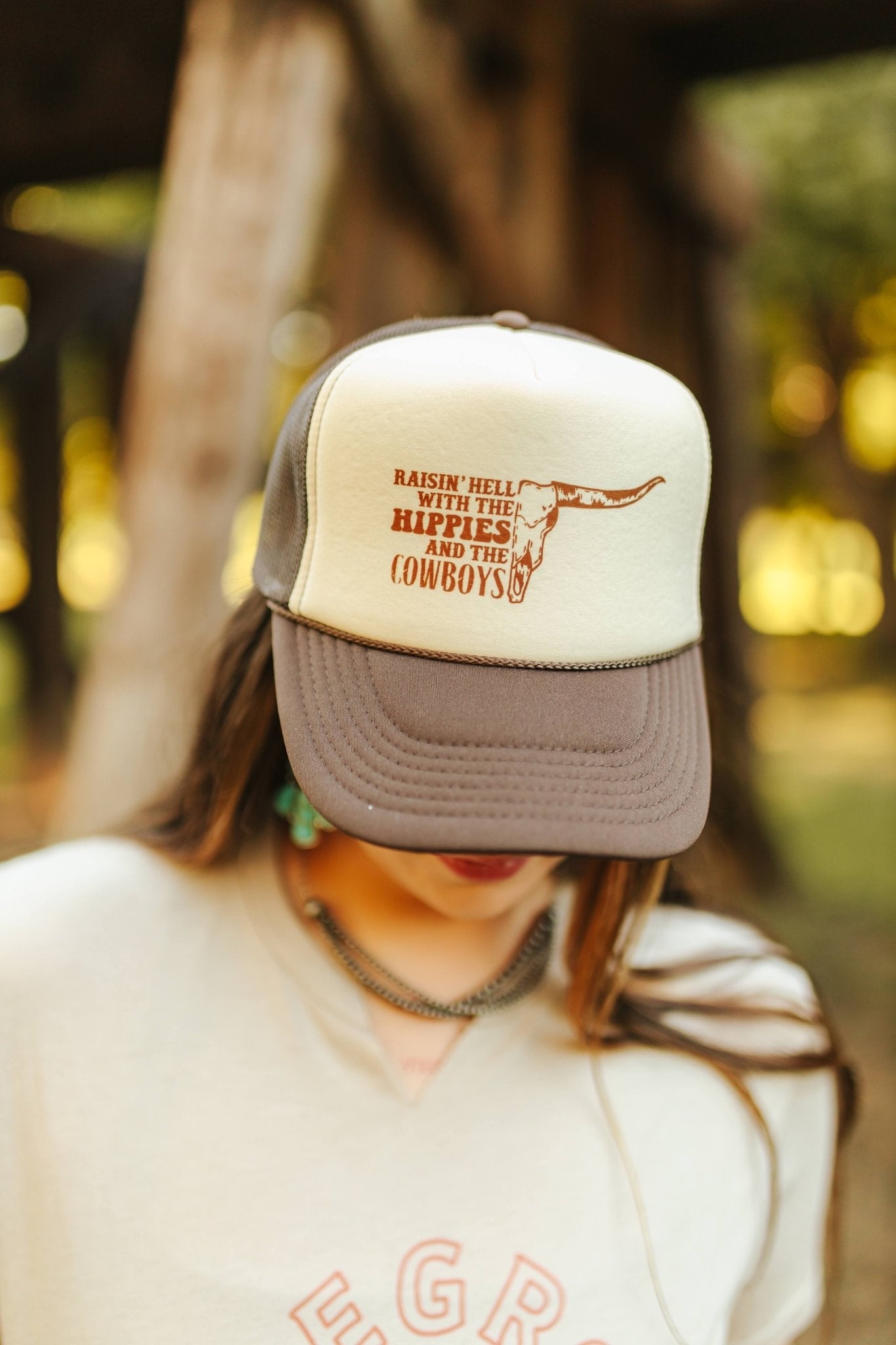 Wild Junkie Raisin' Hell With Hippies & Cowboys Trucker Hat — detail close-up