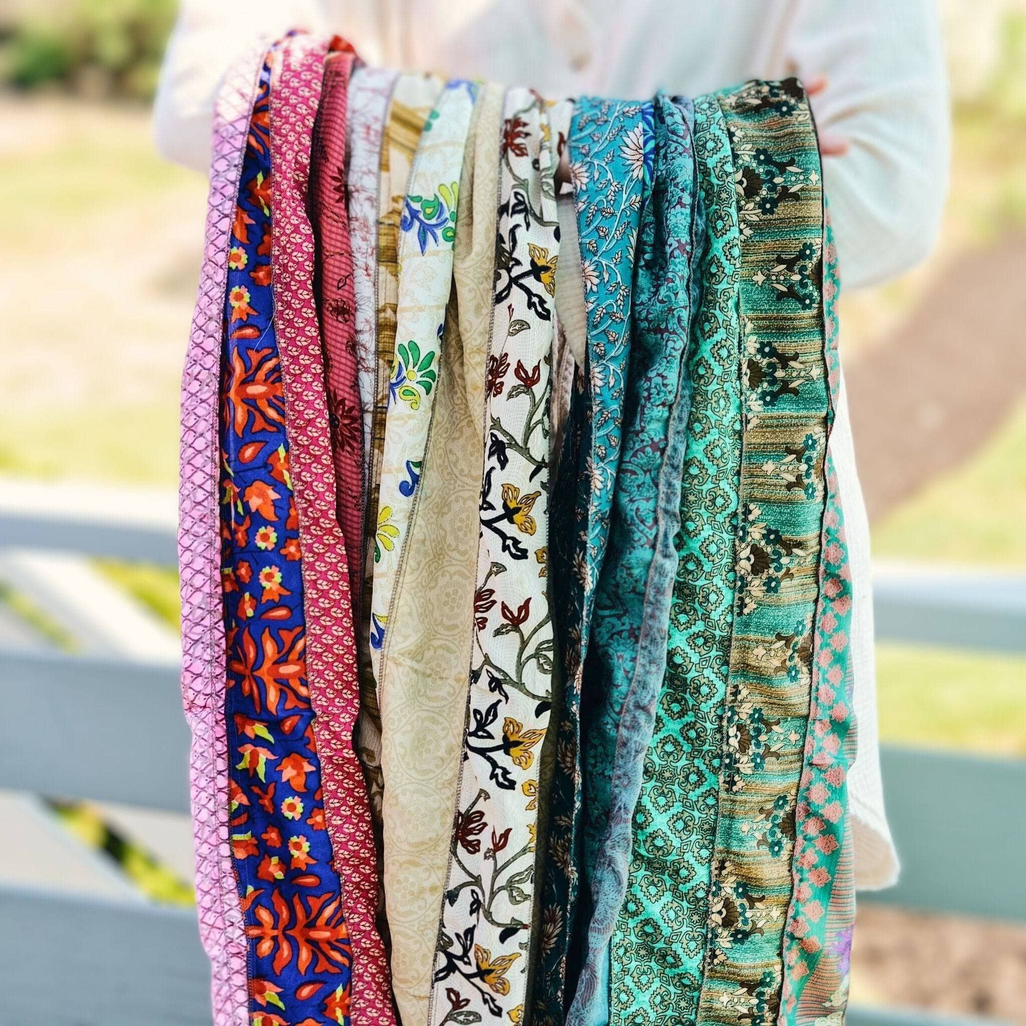 Darn Good Yarn The Original Medley Scarf. ♻️ Made from Sari Magic — lifestyle worn / used context