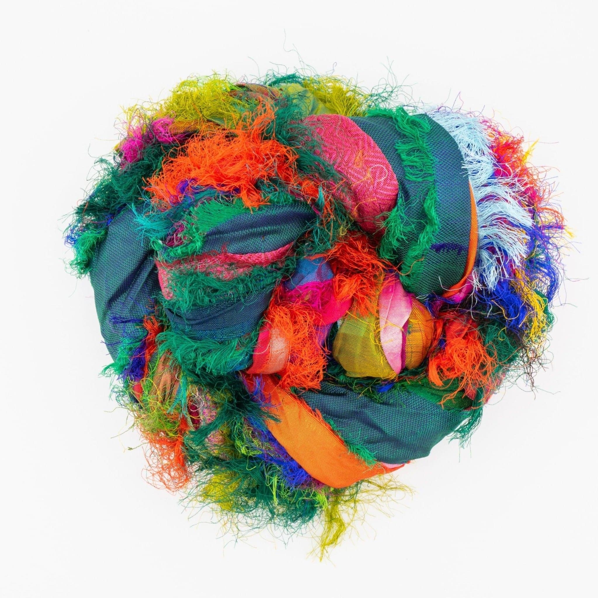 Darn Good Yarn "Nicole's Favorite Ribbon" Recycled Sari Silk "Tibet Jewels"-  Perfect for Crafting, Gift Wrap & More — Darn Good Yarn branding close-up