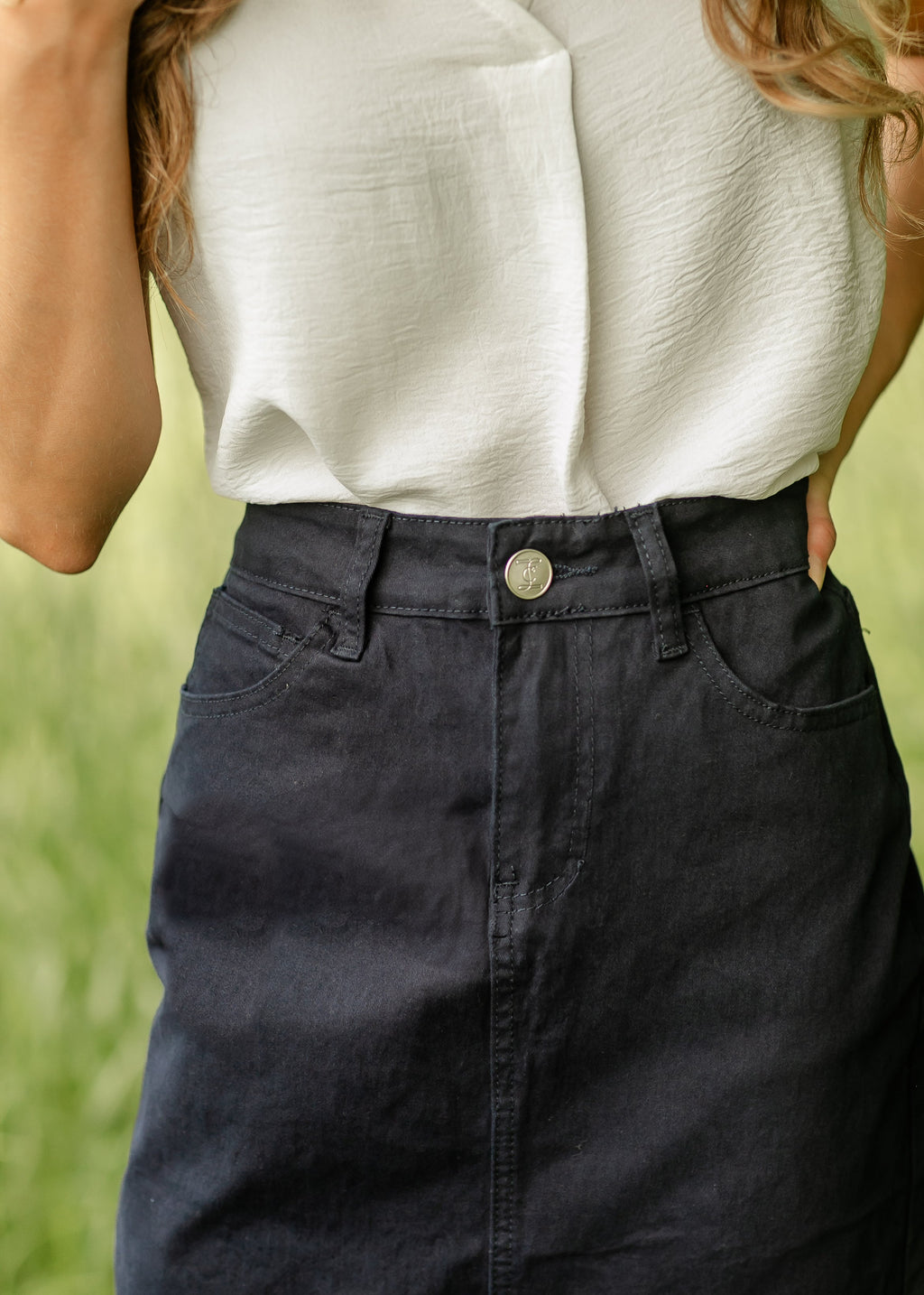 Inherit Co. Remi Navy Denim Midi Skirt — fabric or material detail