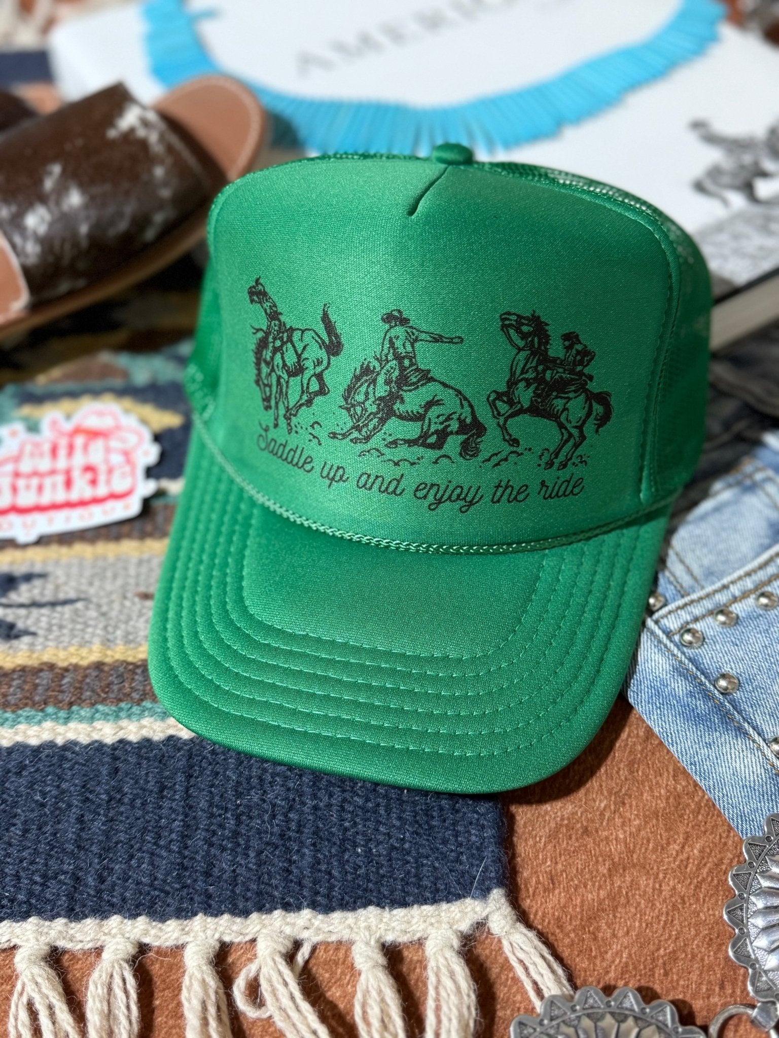 Wild Junkie Saddle Up And Enjoy The Ride Trucker Hat — main product shot