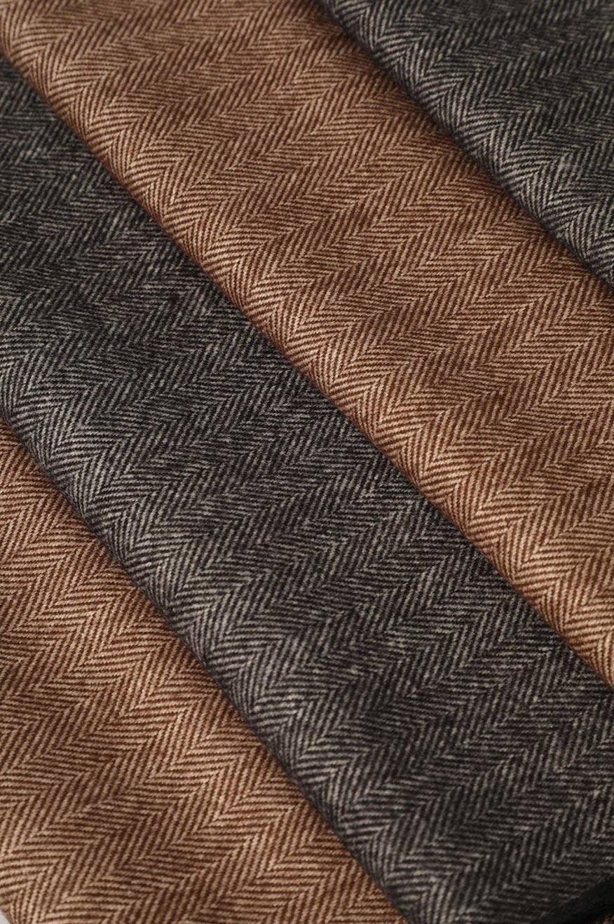 Pretty Little Patriot Herringbone Cashmere Feel Scarf — Pretty Little Patriot branding close-up