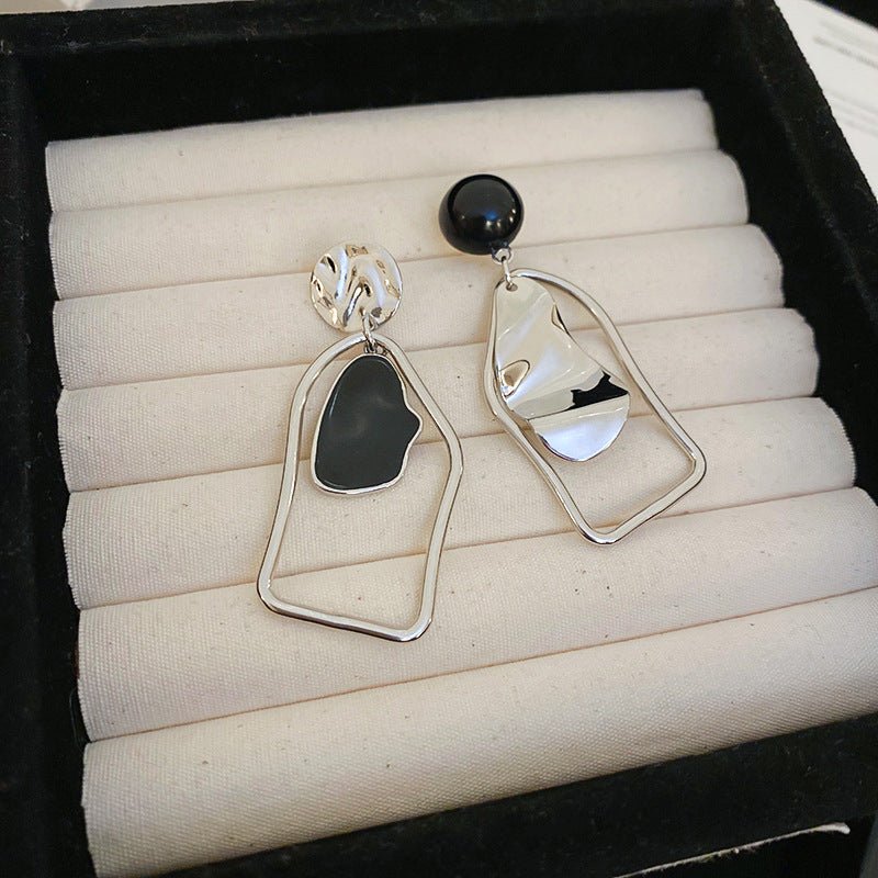 Mariam's Collection Sculptural Asymmetric Drop Earrings with Abstract Lines (MAC321) — Mariam's Collection branding close-up