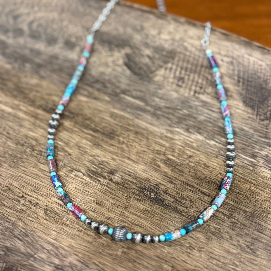 Wild Junkie Corrugated Silver Pearl and Jasper Barrel Bead Necklace — Wild Junkie branding close-up