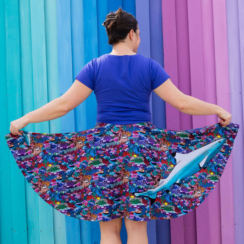 Princess Awesome & Boy Wonder Adult "Chomping Grounds" Shark Reef Super Twirler Dress with Pockets — lifestyle worn / used context